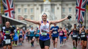 Team Jewish Care runner finishing the London Marathon