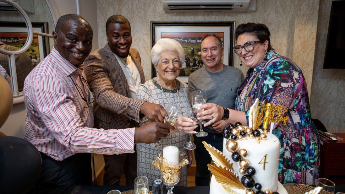 Tenants and staff celebrating Jewish Care Wohl Court Retirement Living 4th Anniversary